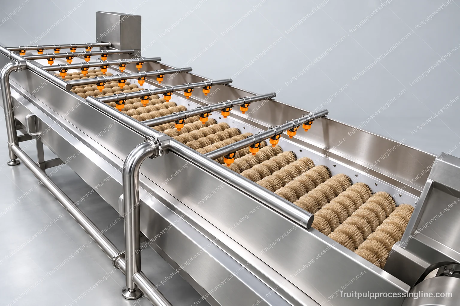 Working section of a brush-roller washer with water spray bars above the exposed roller bed.